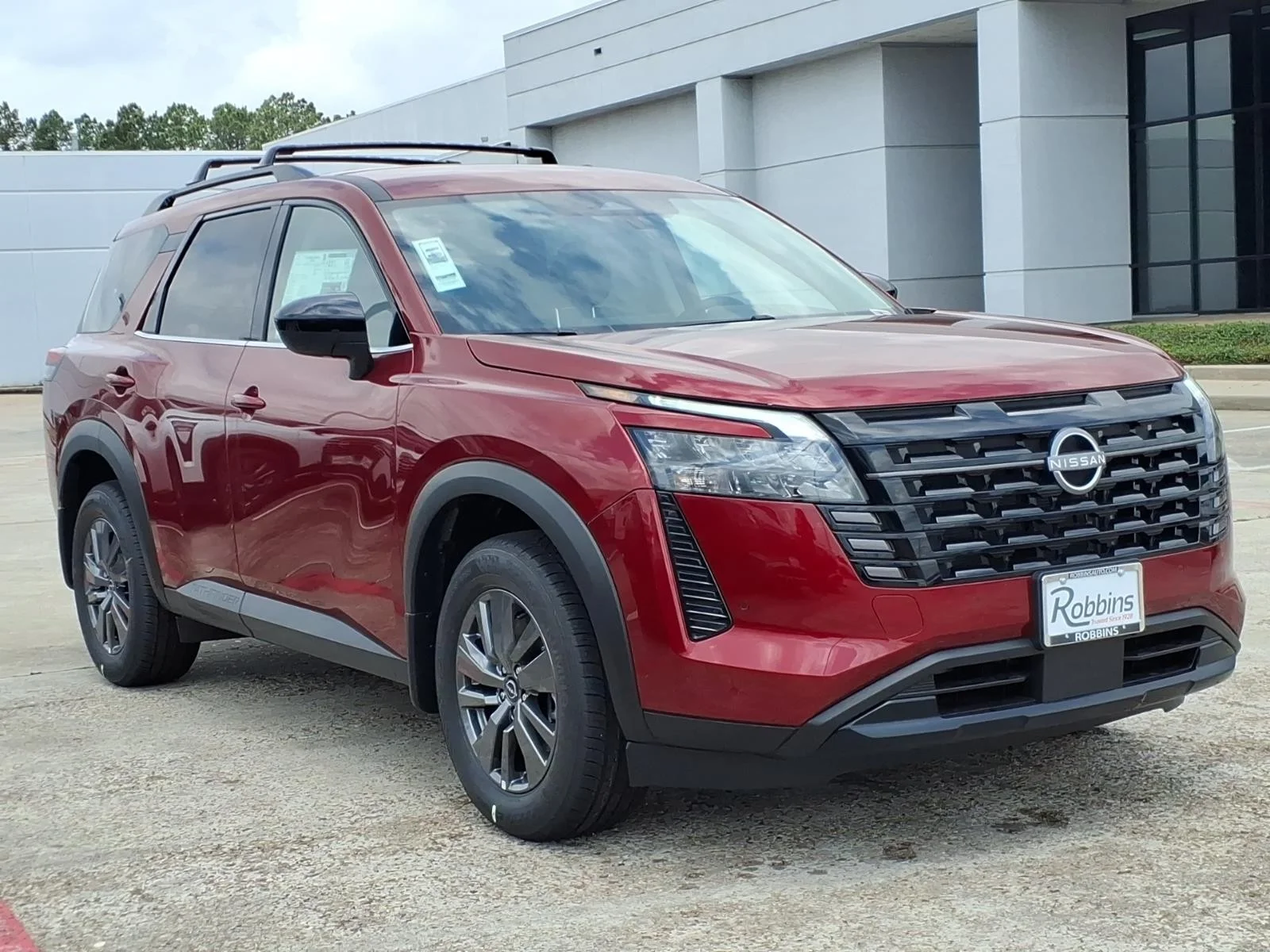 2026 Nissan Pathfinder SV Red at Robbins Nissan