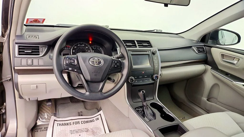 Used 2015 Predawn Gray Mica Toyota 4dr Sedan I4 Automatic LE image 12