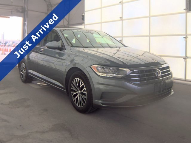 Certified Used 2021 Platinum Gray Metallic Volkswagen SE image 1