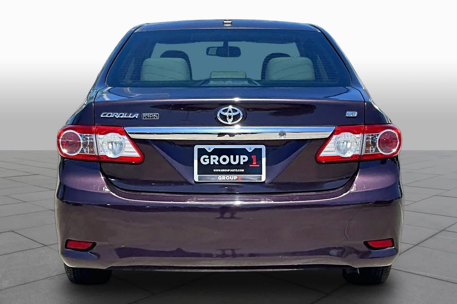 Used 2013 Black Currant Metallic Toyota LE Special Edition image 5