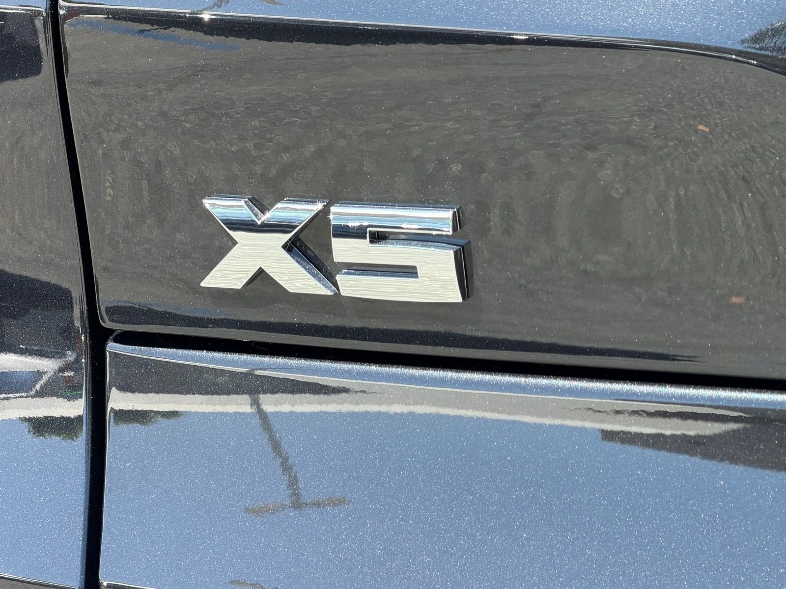 Used 2026 Black Sapphire Metallic BMW M60i image 14