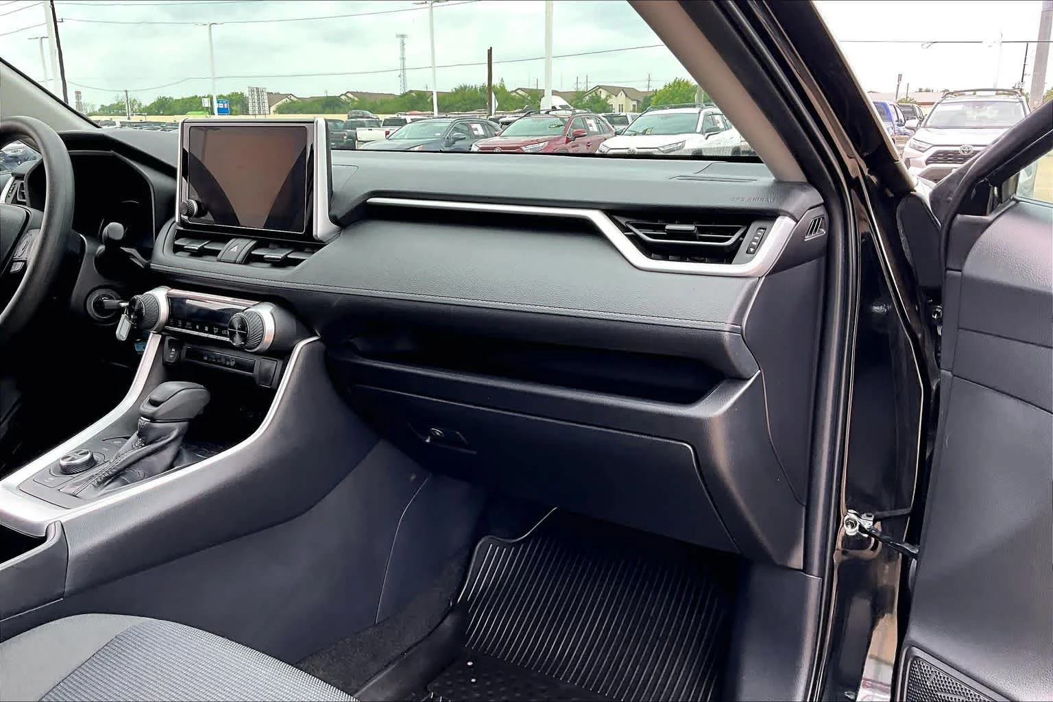 Used 2024 Midnight Black Metallic Toyota Hybrid LE image 18