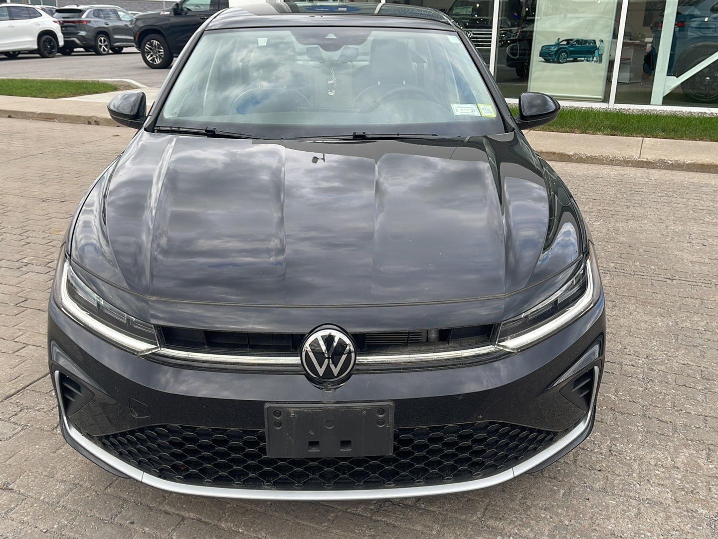 Certified Used 2025 Deep Black Pearl Volkswagen SE image 2