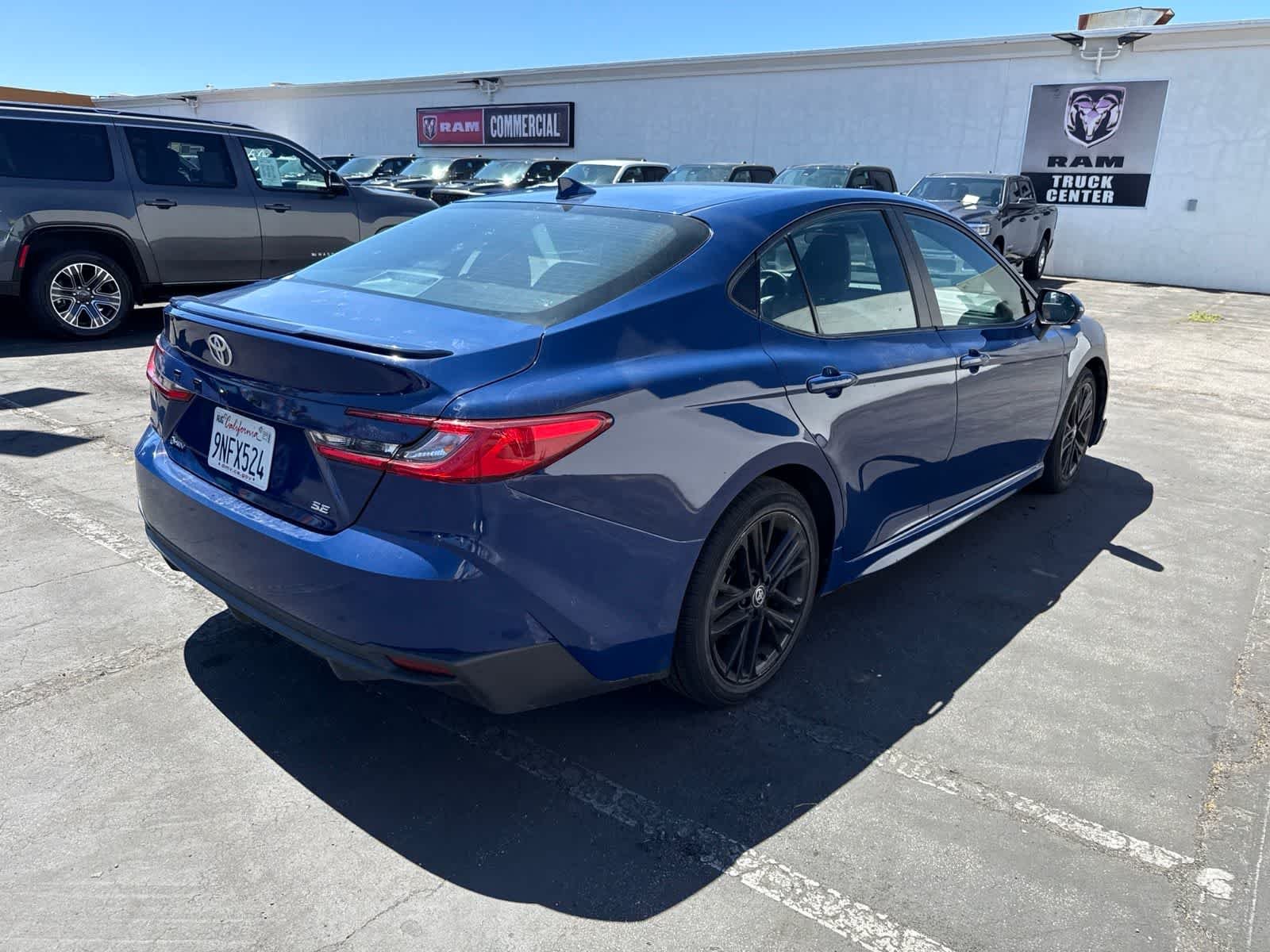 Used 2025 Reservoir Blue Toyota SE image 14