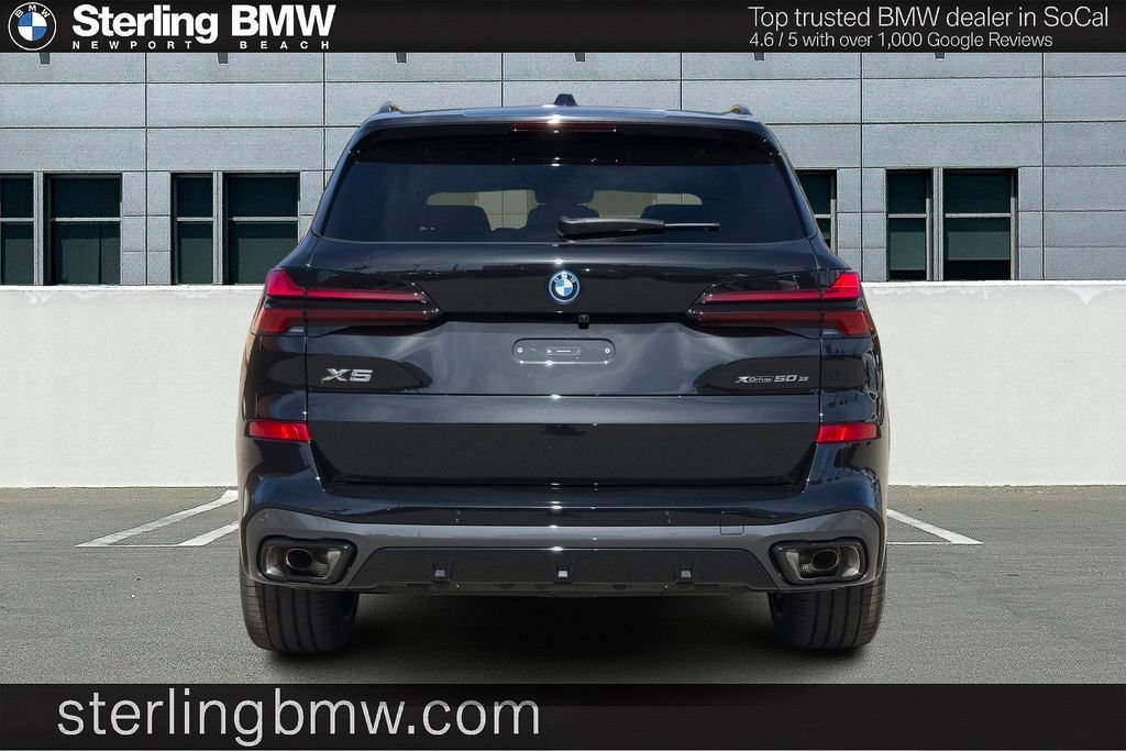New 2026 Black Sapphire Metallic BMW xDrive50e image 17