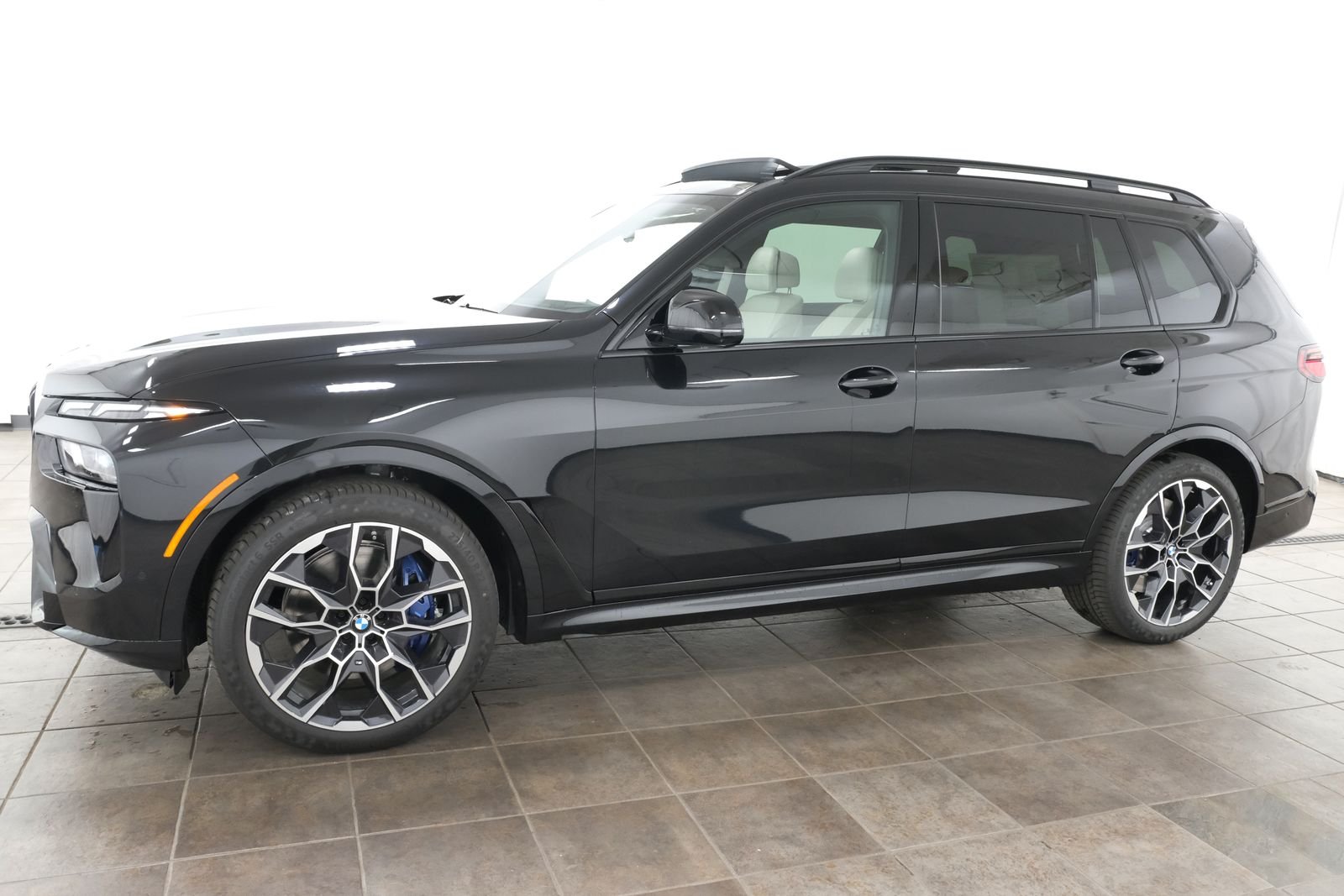 New 2027 Black Sapphire Metallic BMW M60i image 2