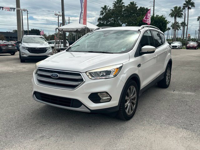 Used 2017 Ford Escape Titanium with VIN 1FMCU0JD9HUE01839 for sale in Stuart, FL