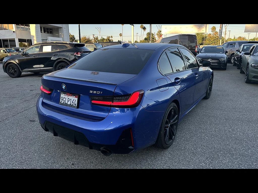 Used 2023 Portimao Blue Metallic BMW 330i image 2