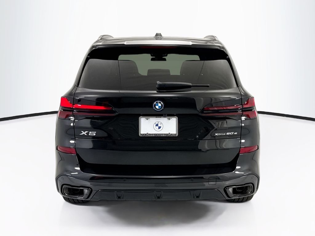 New 2026 Black Sapphire Metallic BMW xDrive50e image 6