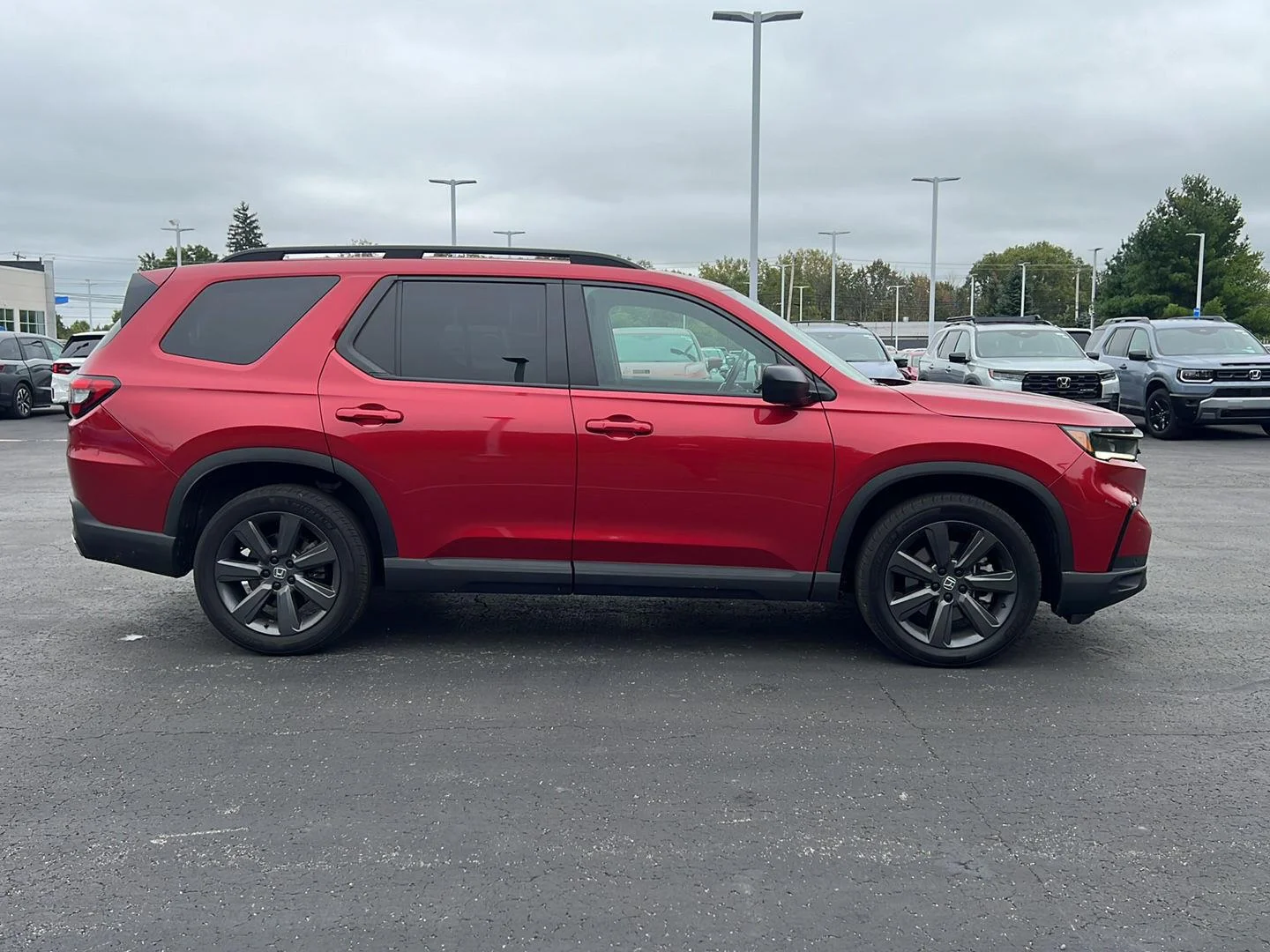 Used 2025 Radiant Red Metallic II Honda Sport image 4