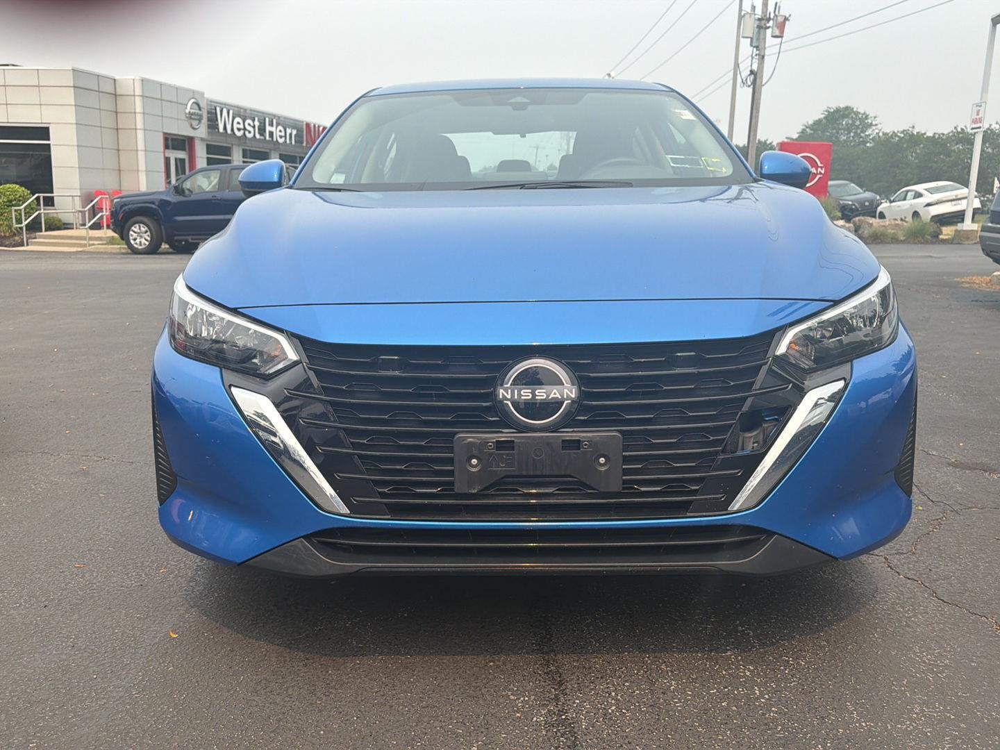 Used 2024 Electric Blue Metallic Nissan SV image 2