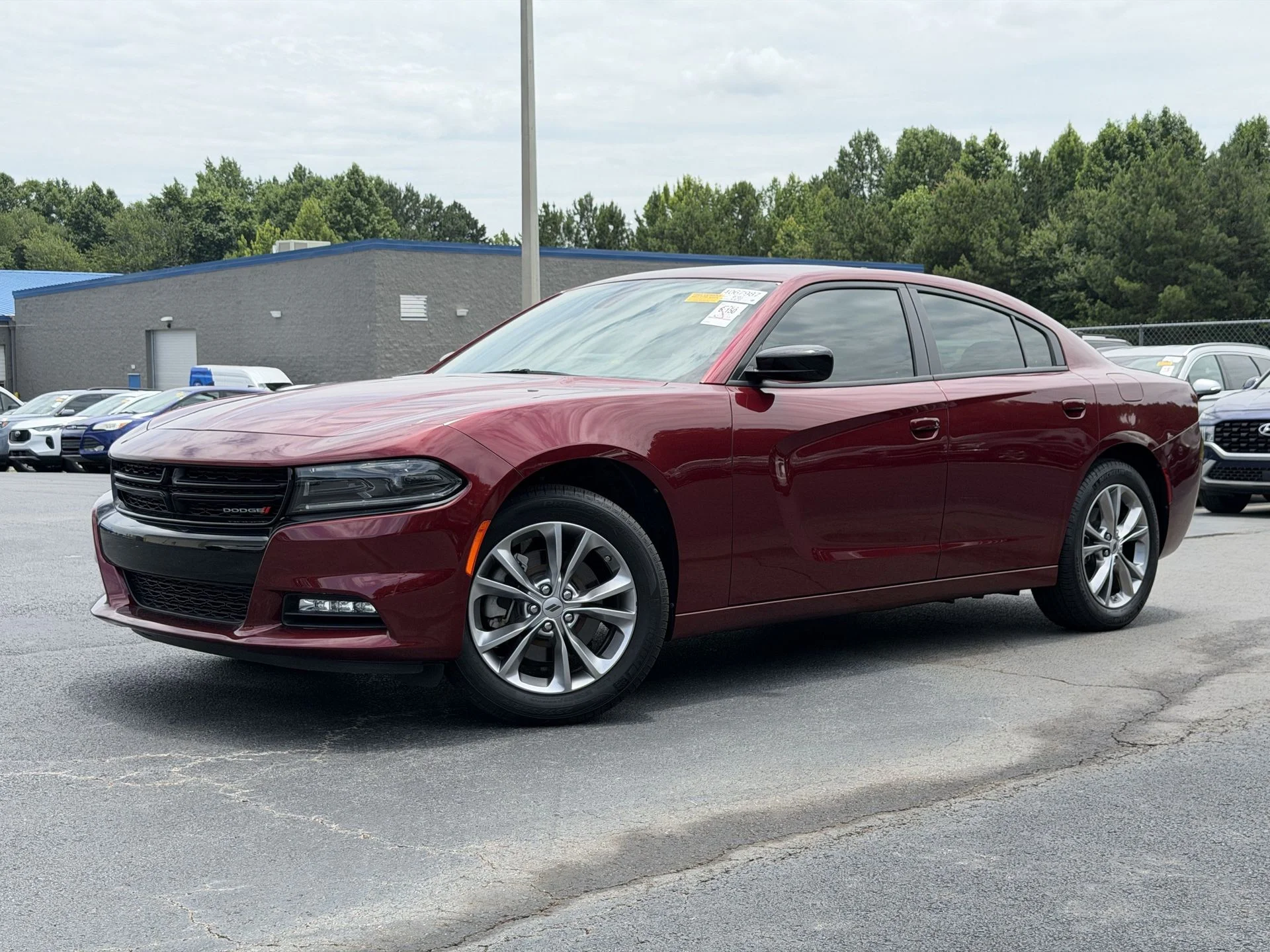 Used 2023 Octane Red Pearlcoat Dodge SXT image 1