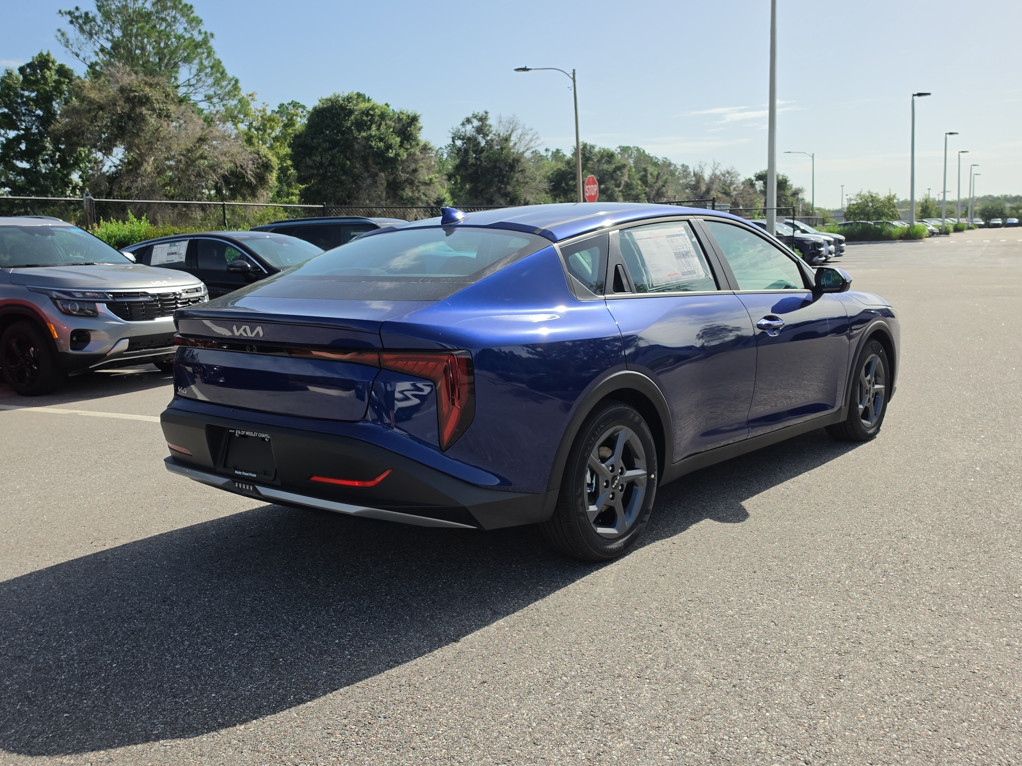New 2026 Deep Sea Blue Kia LXS image 8