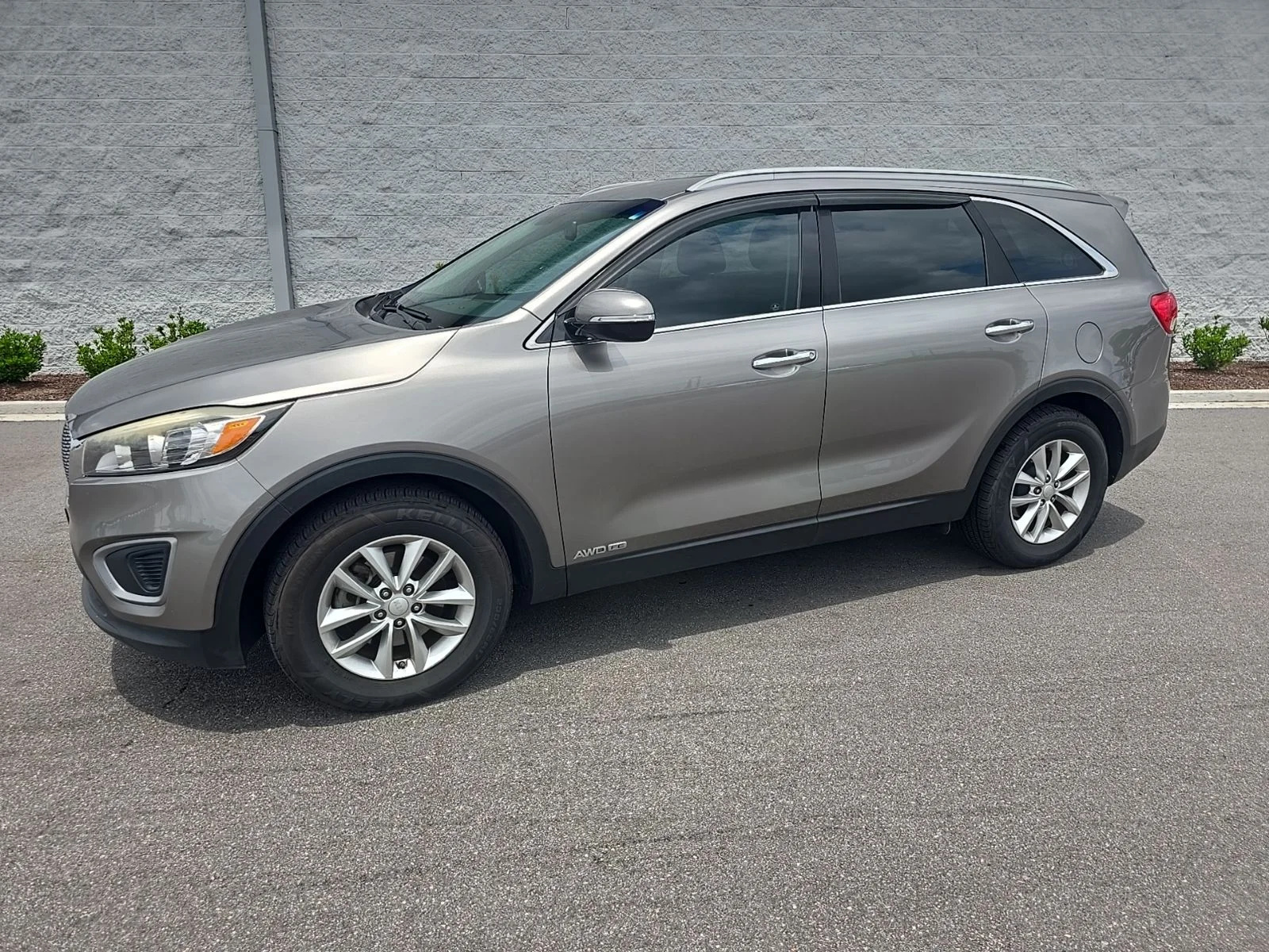 Used 2016 Titanium Silver Kia LX image 1