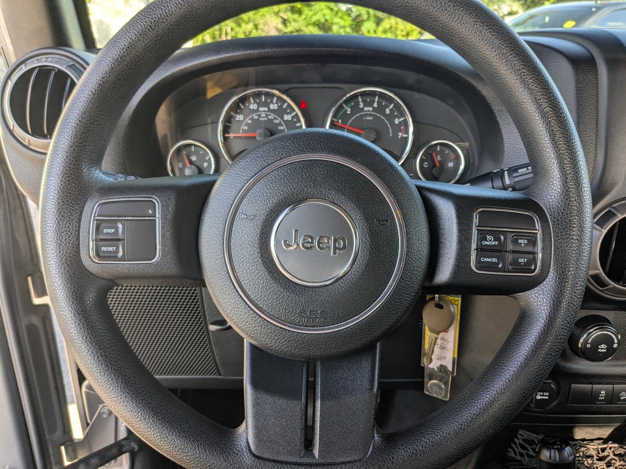 Used 2015 Billet Silver Metallic Clearcoat Jeep Sport image 13