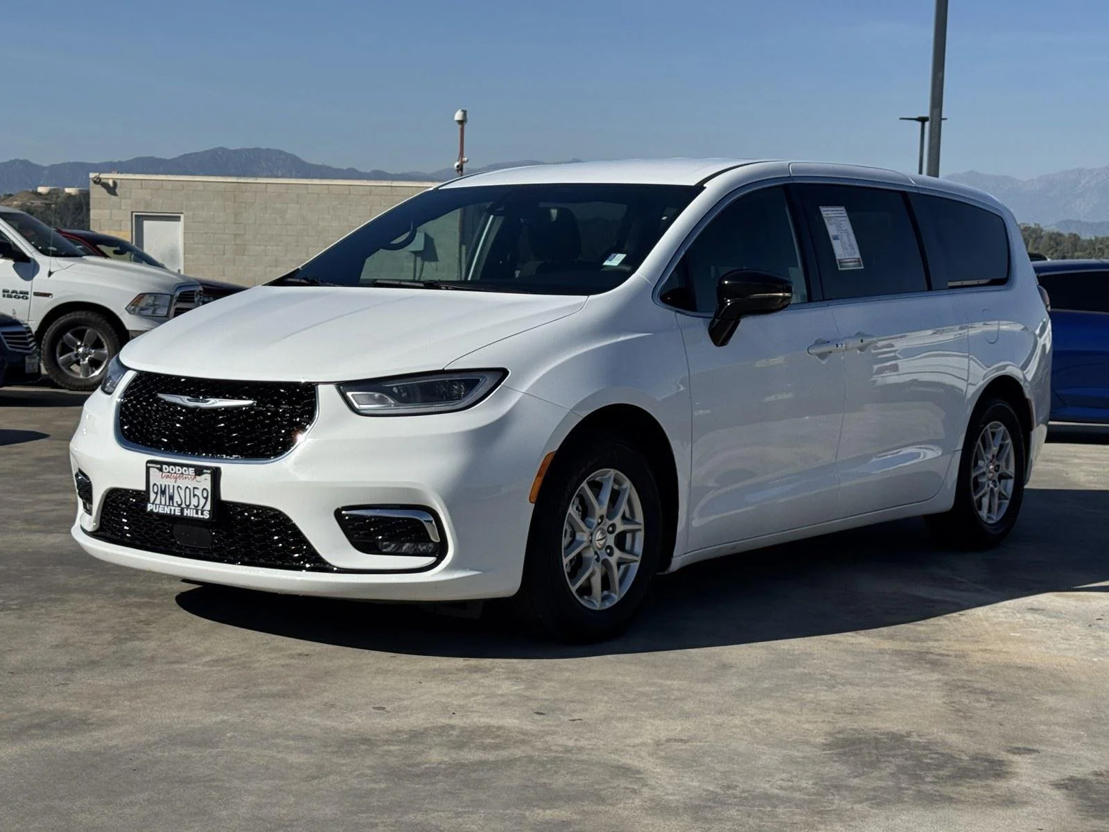 Used 2024 Bright White Clearcoat Chrysler Touring image 3