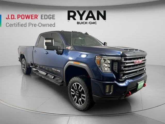 Used 2023 PACIFIC BLUE METALLIC GMC AT4 image 1
