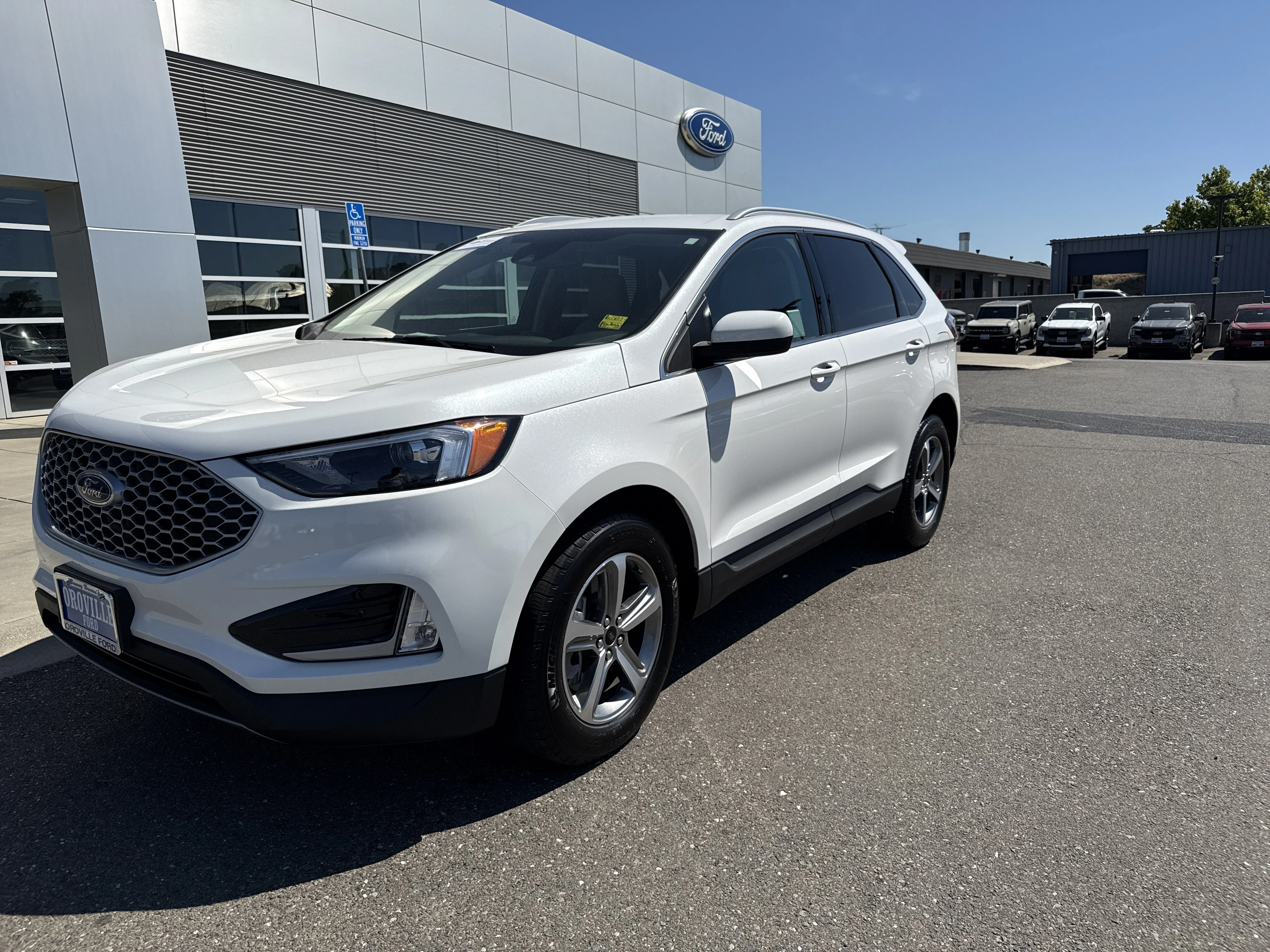Used 2024 Star White Metallic Tri-Coat Ford SEL image 1