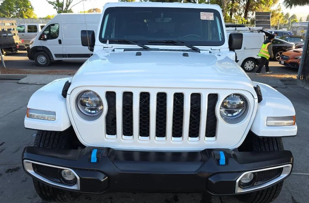 Used 2022 Jeep Wrangler Unlimited Sahara 4XE with VIN 1C4JJXP67NW178884 for sale in Kansas City
