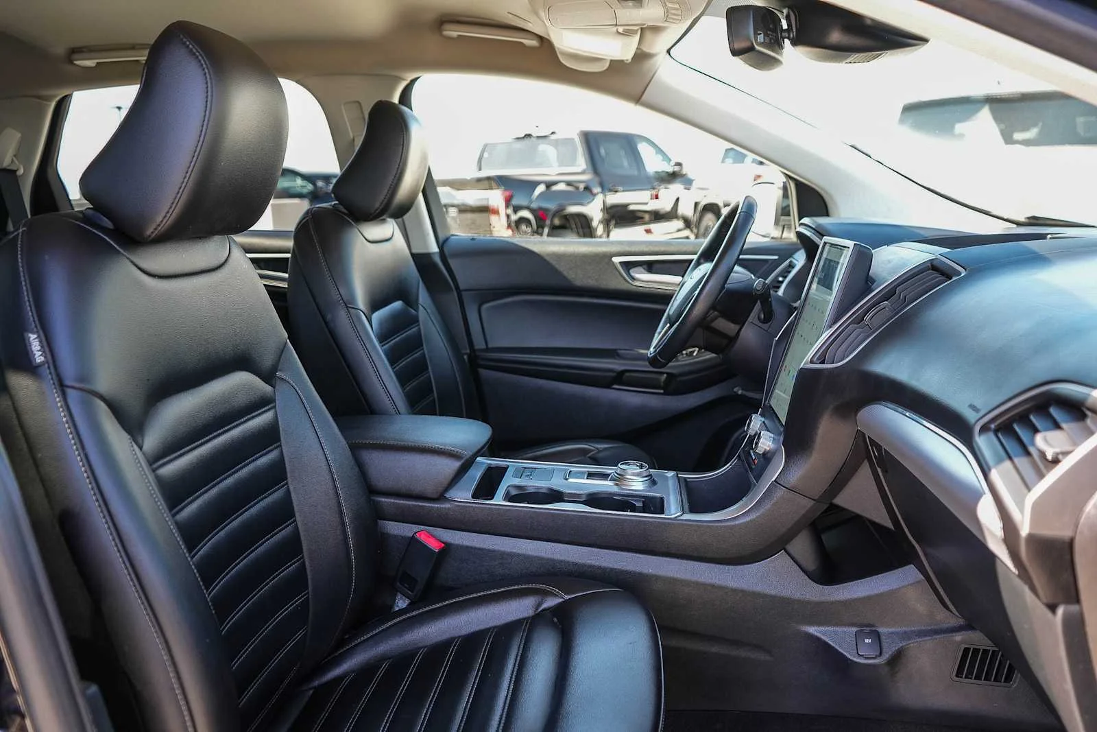 Used 2021 Agate Black Metallic Ford SEL image 18