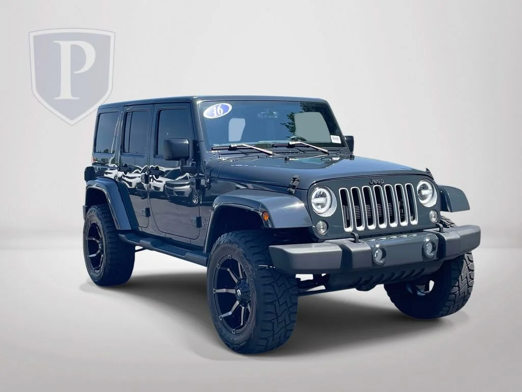 Used 2016 Black Jeep Unlimited Sahara image 2