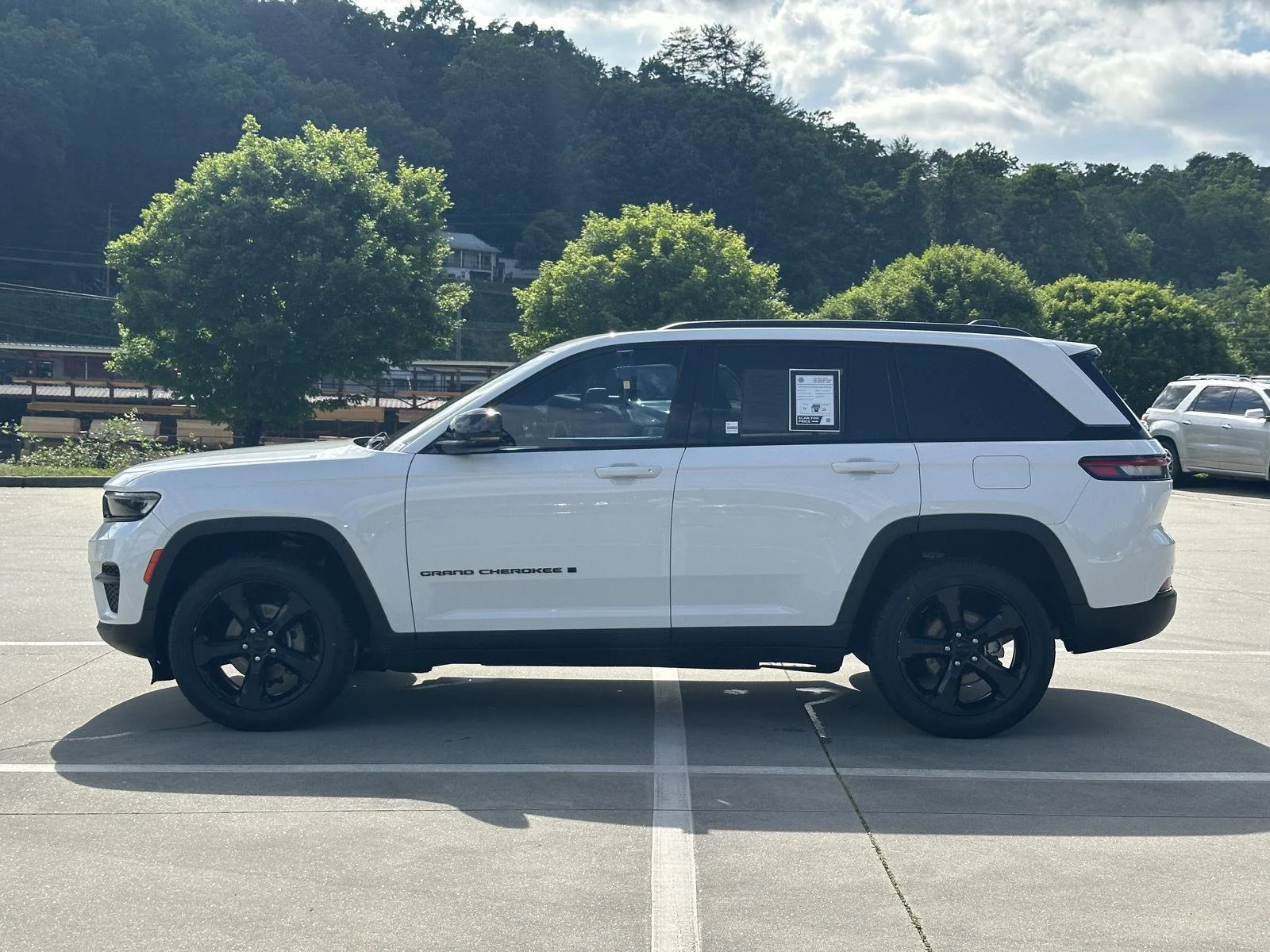 Used 2023 Bright White Clearcoat Jeep Altitude image 4