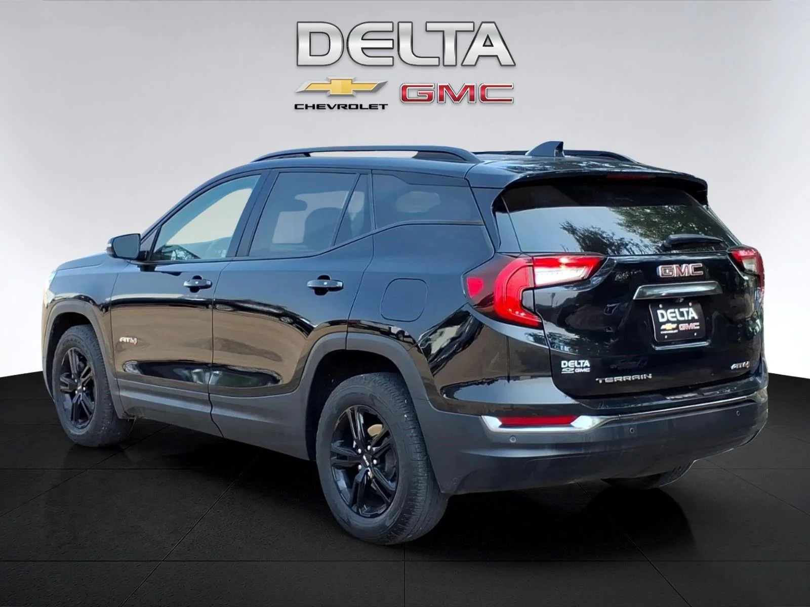 Used 2024 Ebony Twilight Metallic GMC AT4 image 12