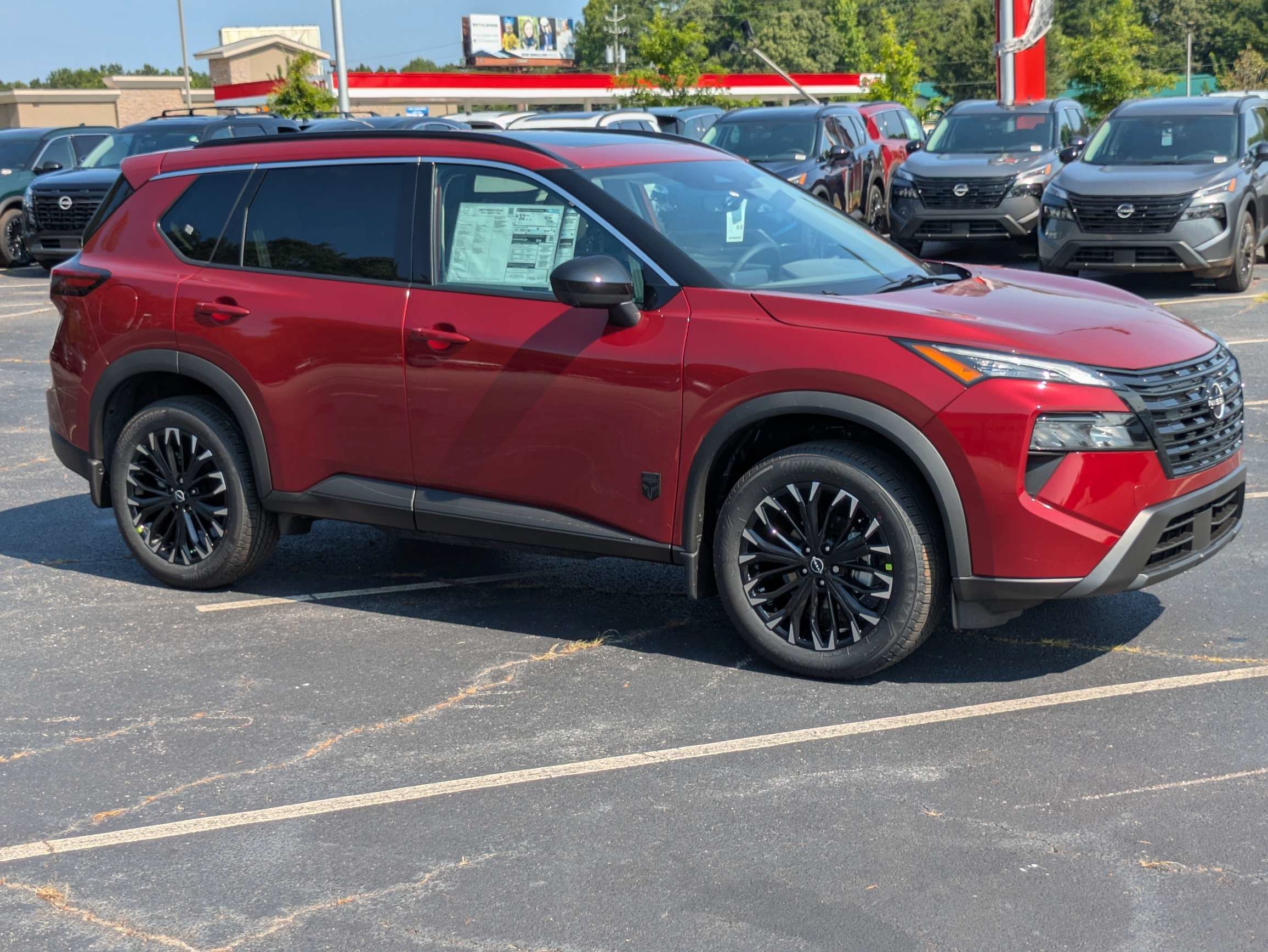 New 2026 Red Nissan Dark Armor image 1