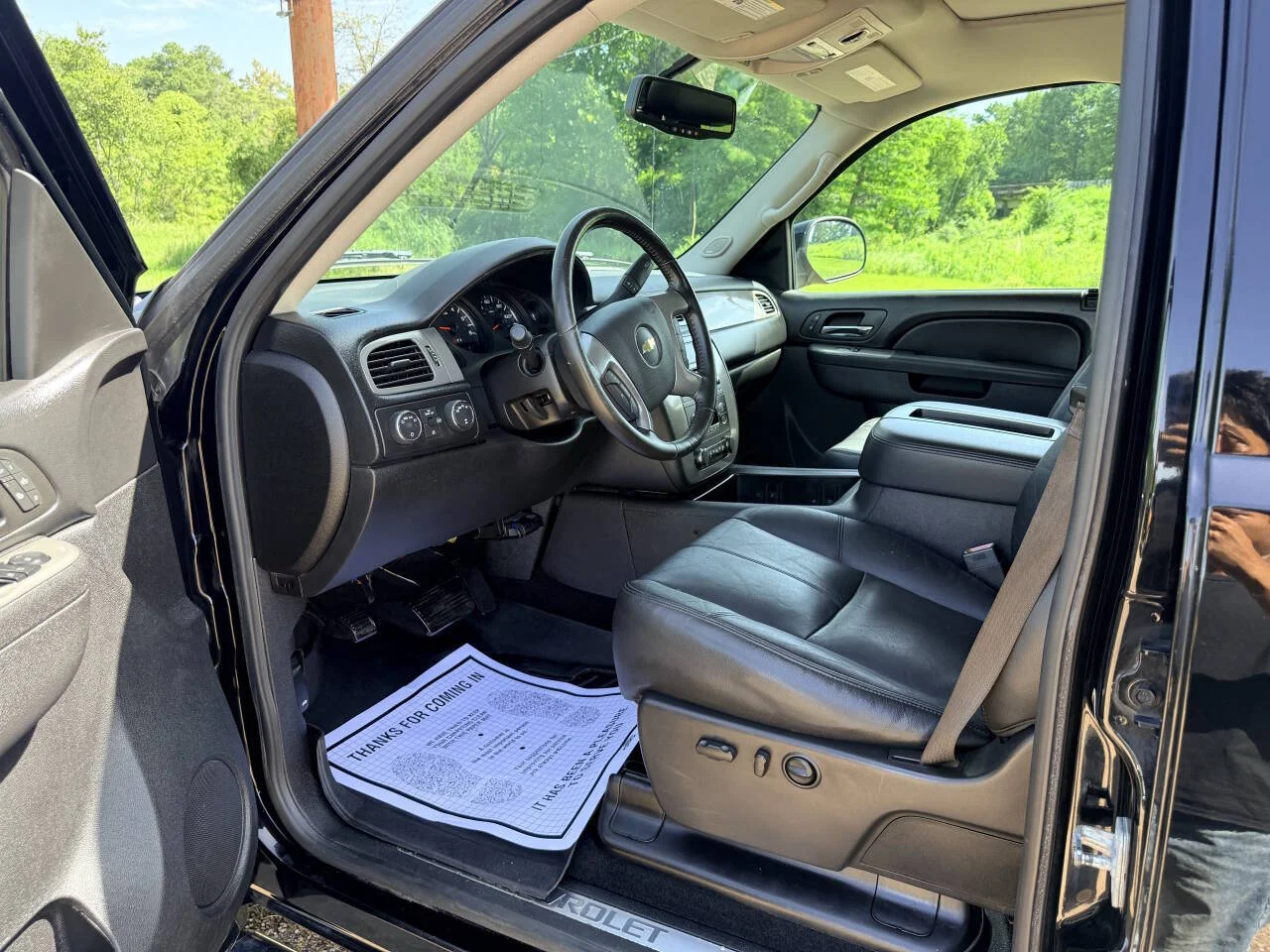 Used 2013 Black Chevrolet LTZ 4x4 4dr Crew Cab 5.8 ft. SB image 14