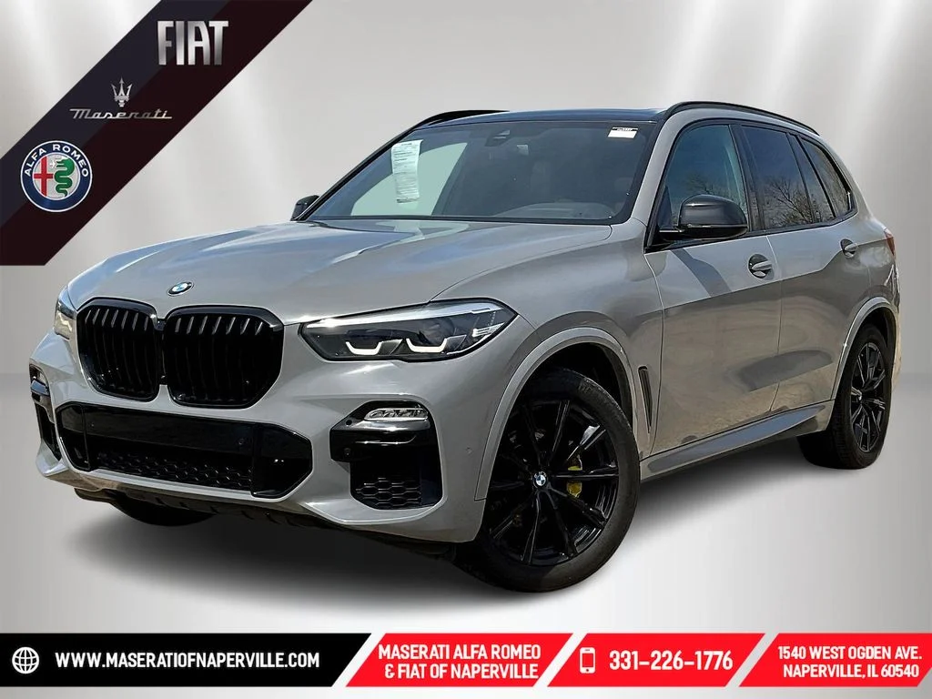 Used 2021 Black Sapphire Metallic BMW xDrive40i image 1