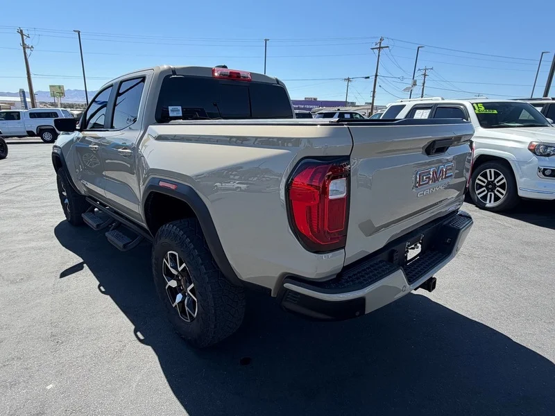 Used 2024 Desert Sand Metallic GMC AT4X image 5