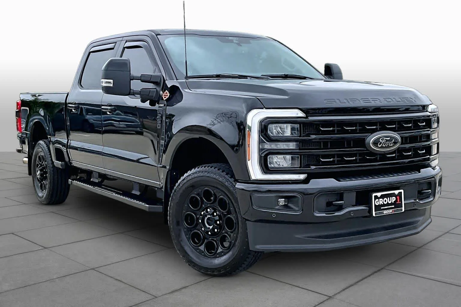 Used 2024 Agate Black Metallic Ford LARIAT image 3