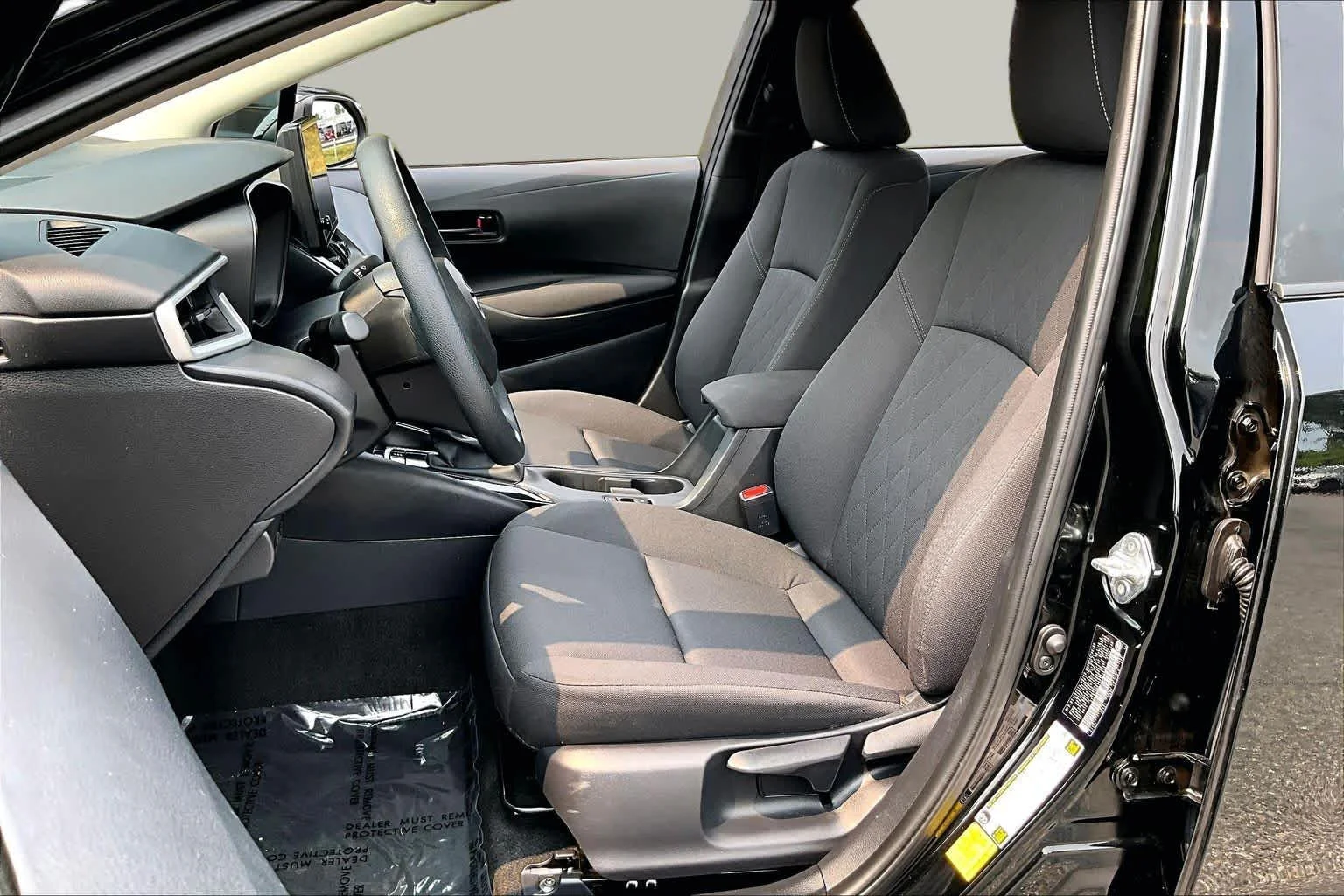 Used 2024 Midnight Black Metallic Toyota LE image 8