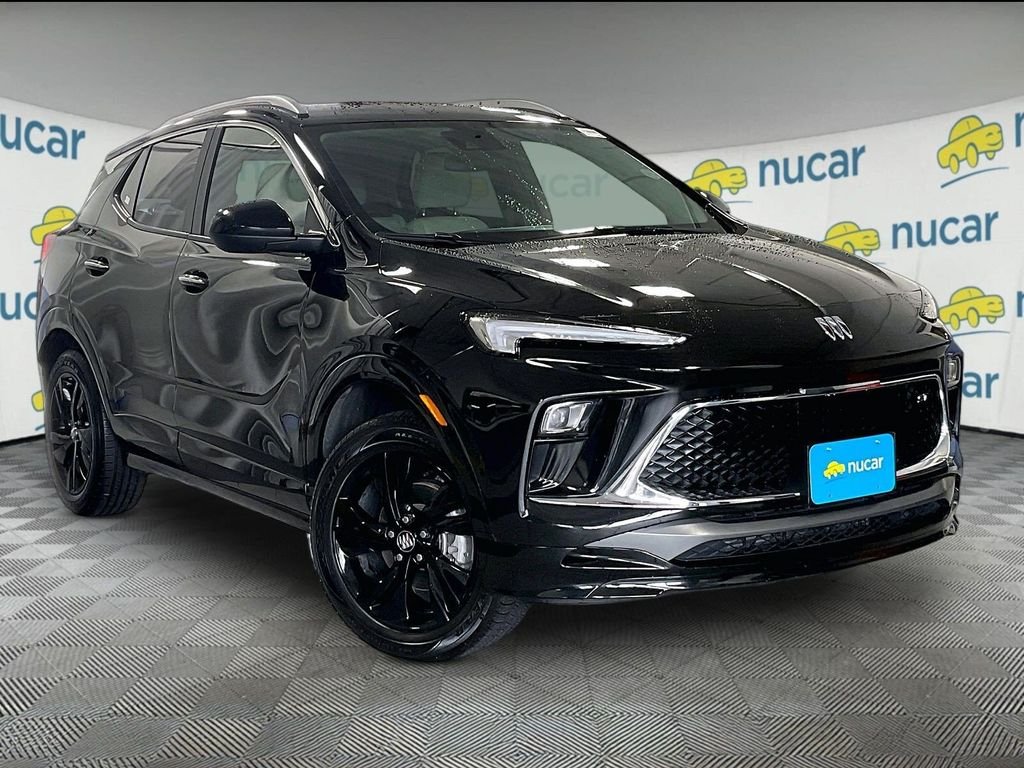 Used 2024 Black Buick Sport Touring image 1