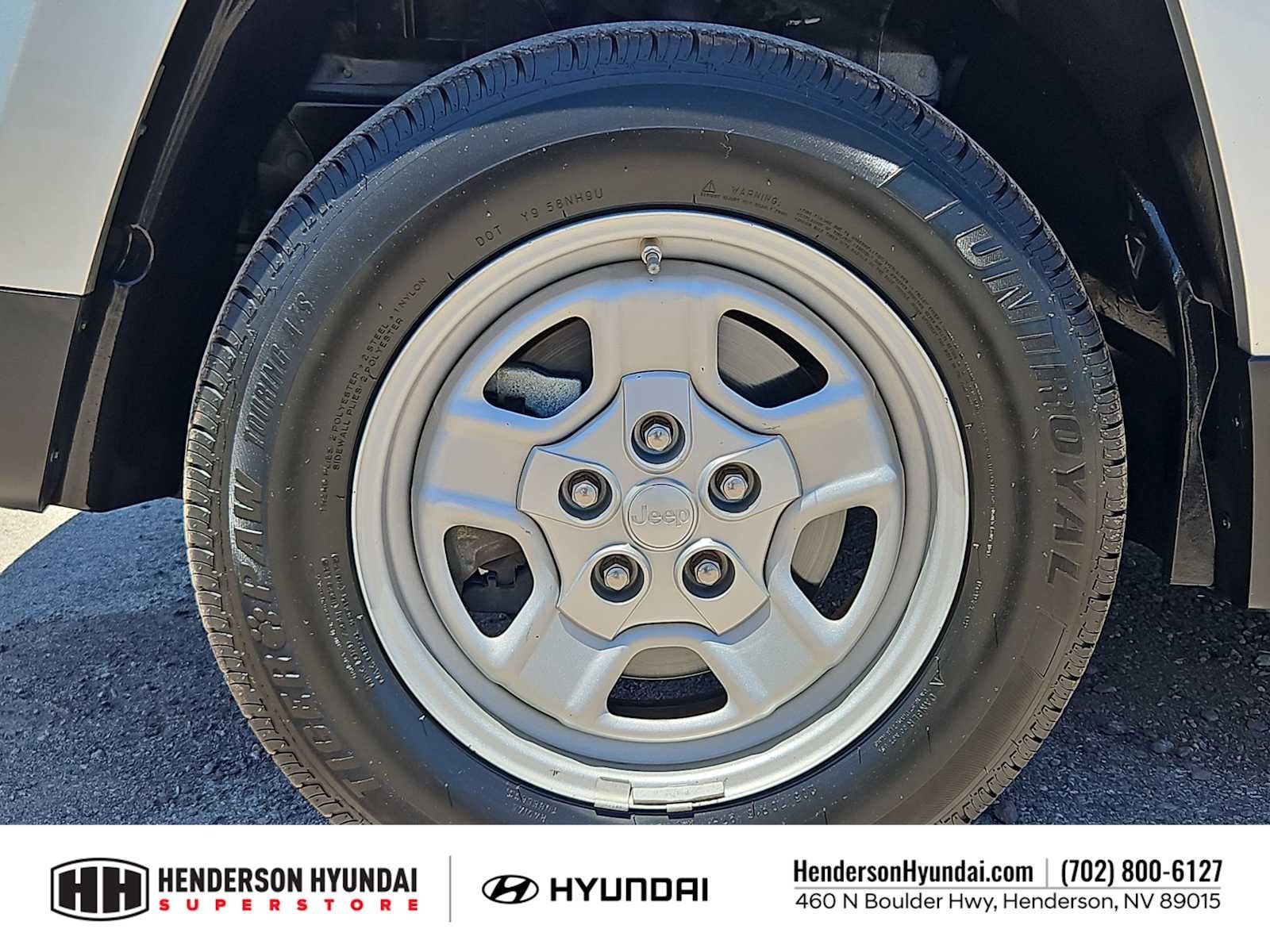 Used 2011 Bright Silver Metallic Jeep Sport image 14