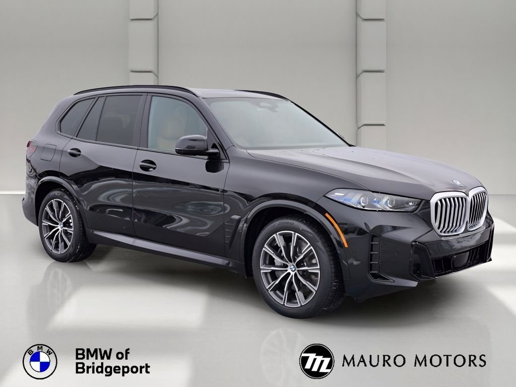 Used 2026 Black BMW xDrive50e image 1