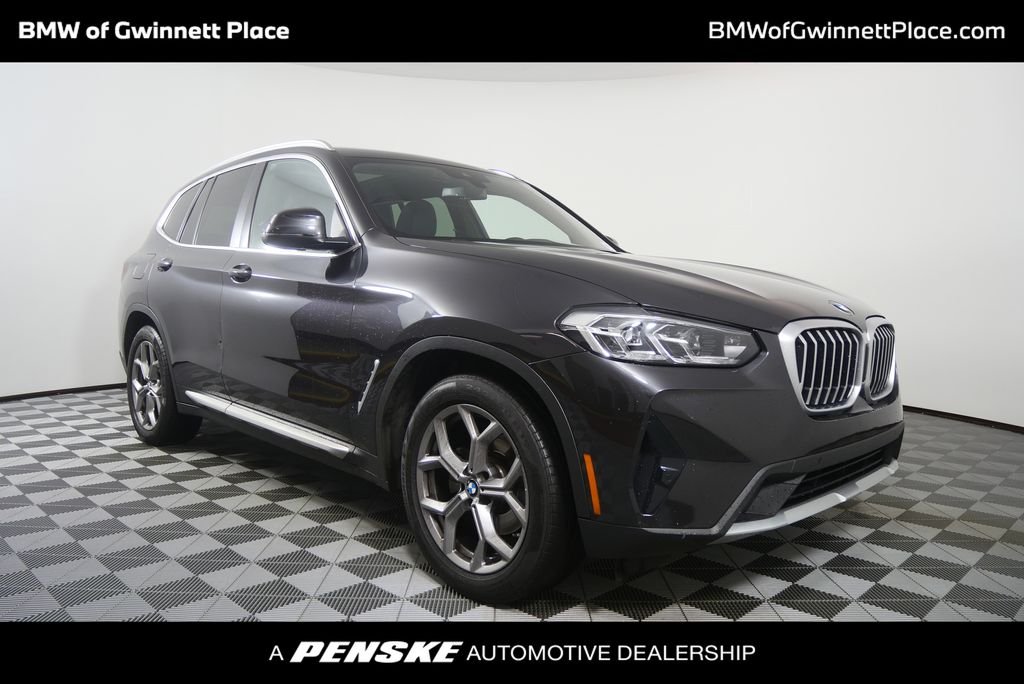 Certified Used 2023 Dark Graphite Metallic BMW sDrive30i image 1