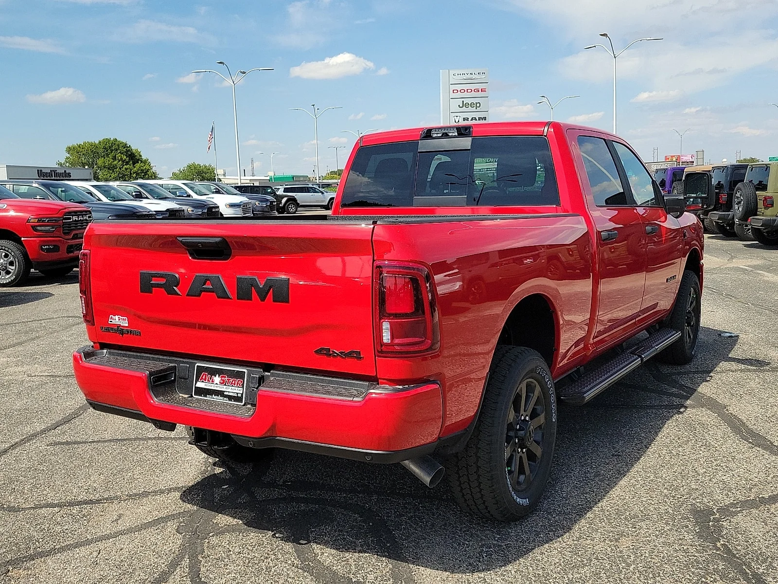 New 2026 Flame Red Ram LONE STAR CREW CAB 4X4 6