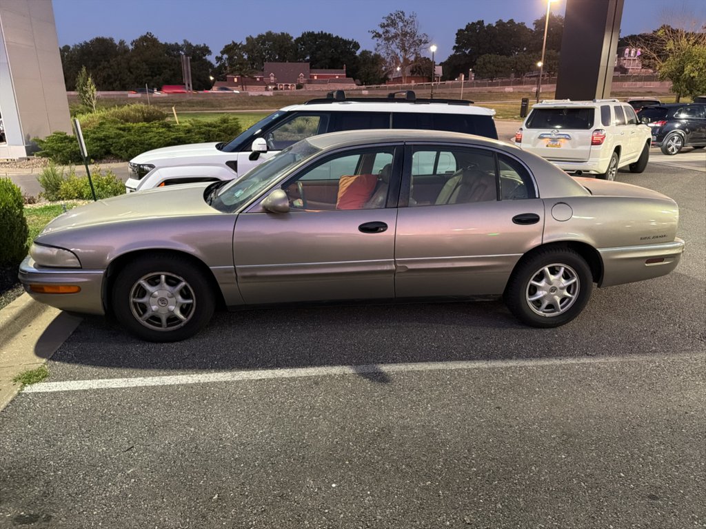 Used 2000 Dark Brown Stripe Buick Base image 4