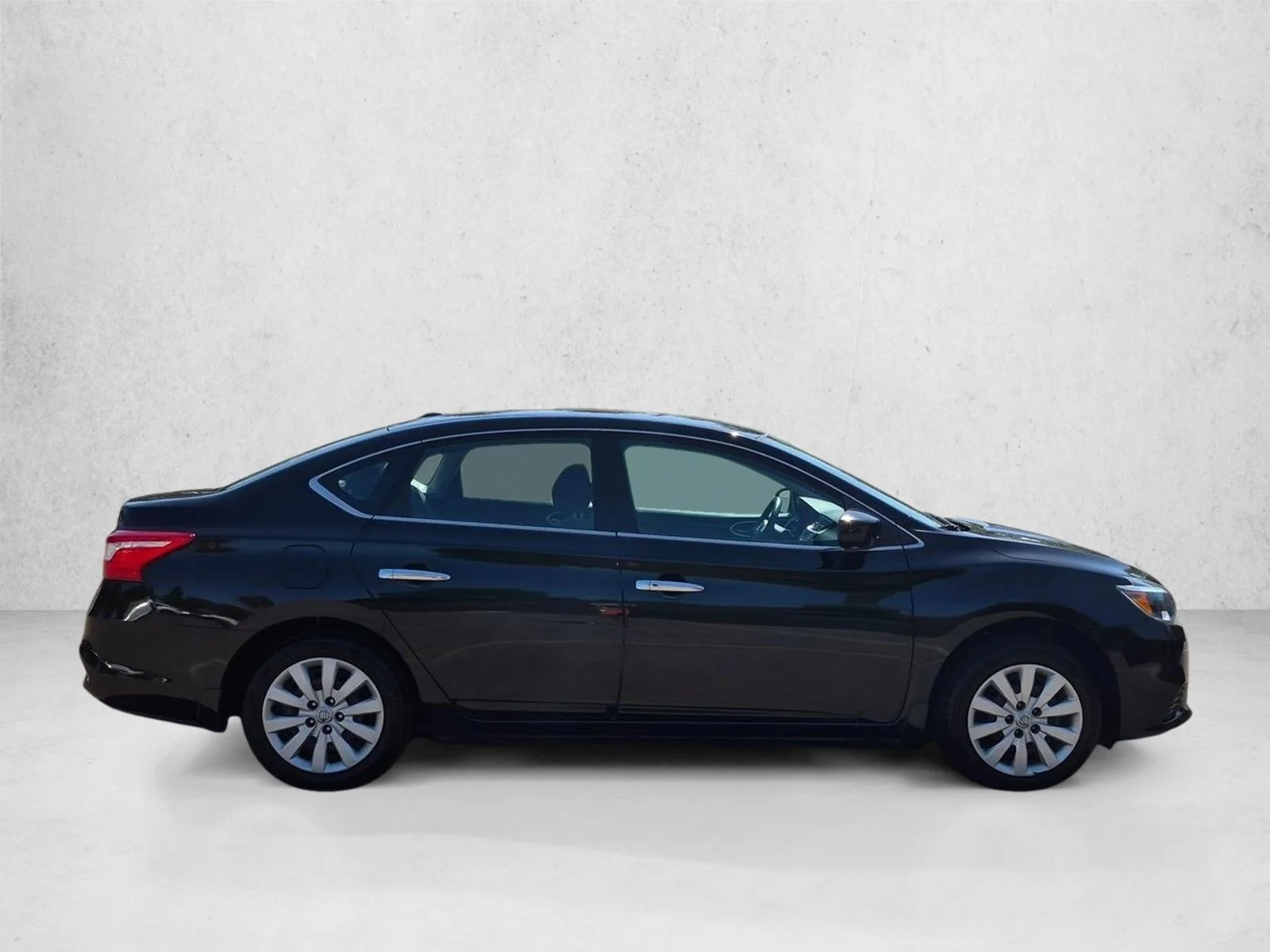 Used 2017 Super Black Nissan SV image 4