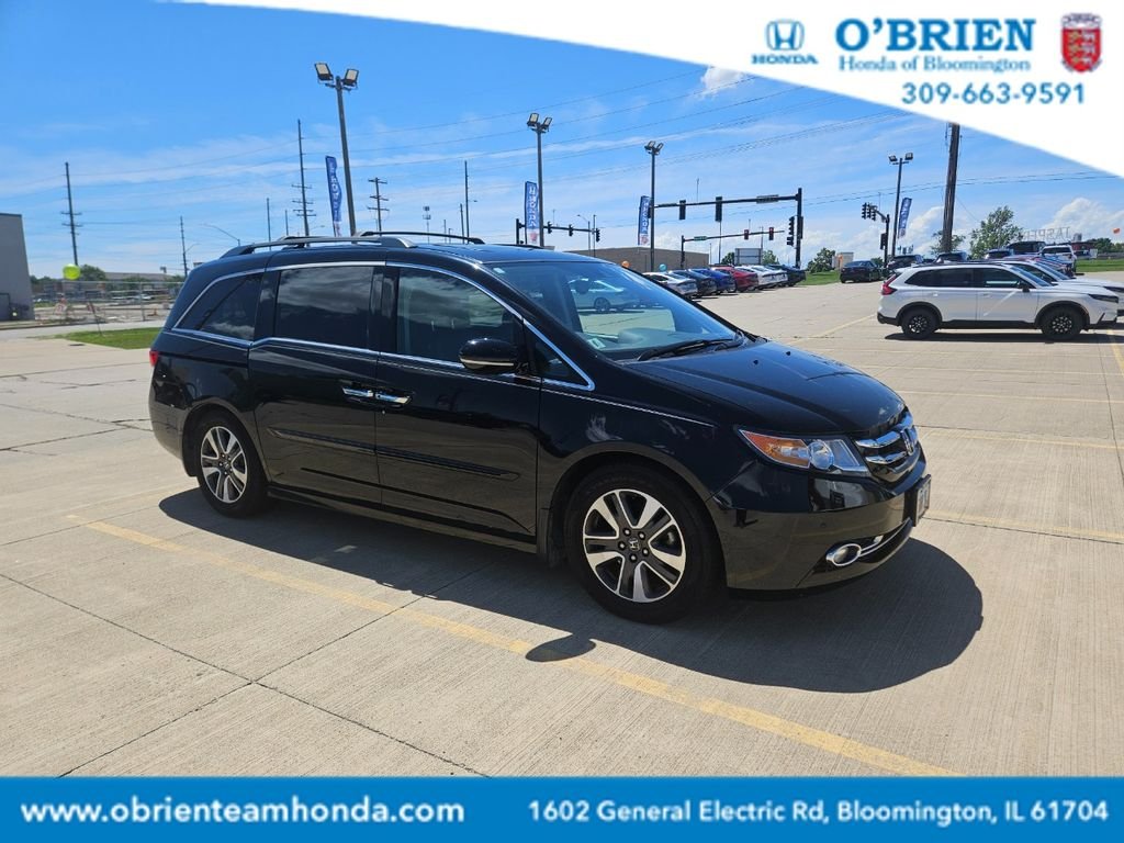 Used 2014 Crystal Black Pearl Honda Touring image 1