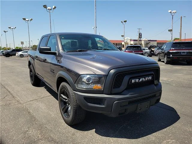 Used 2024 Granite Crystal Metallic Clearcoat RAM SLT 4x2 Crew Cab 5.6 ft. box 140 in. WB image 5
