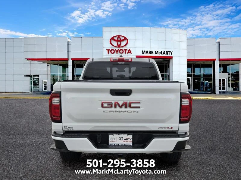 Used 2023 Summit White GMC 4WD Crew Cab AT4 image 4