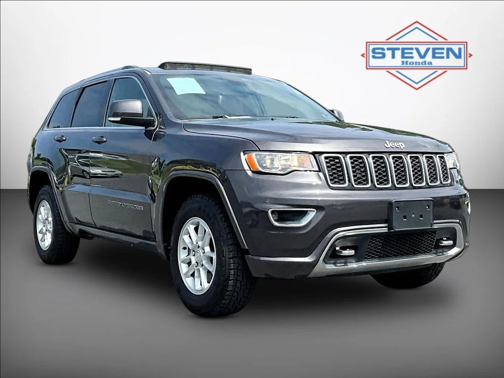 Used 2018 Crystal Metallic Jeep Limited image 1
