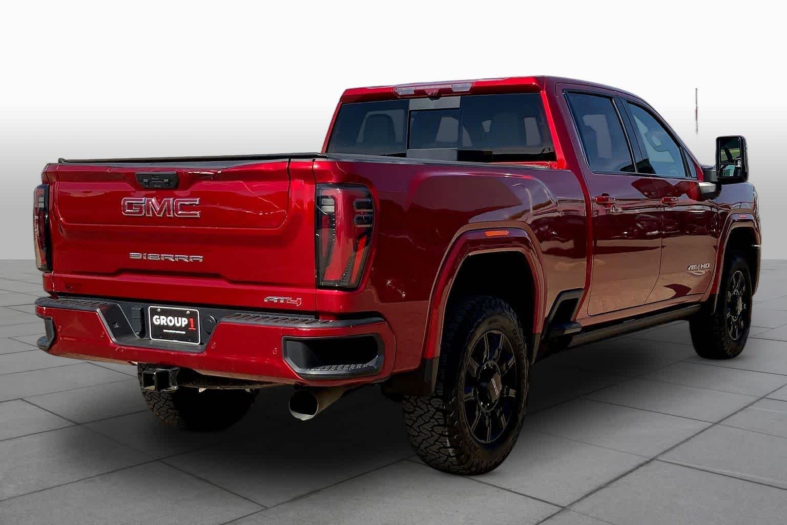 Used 2024 Volcanic Red Tintcoat GMC AT4 image 13