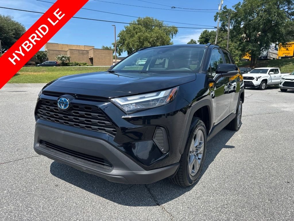 Used 2024 Midnight Black Metallic Toyota LE image 1