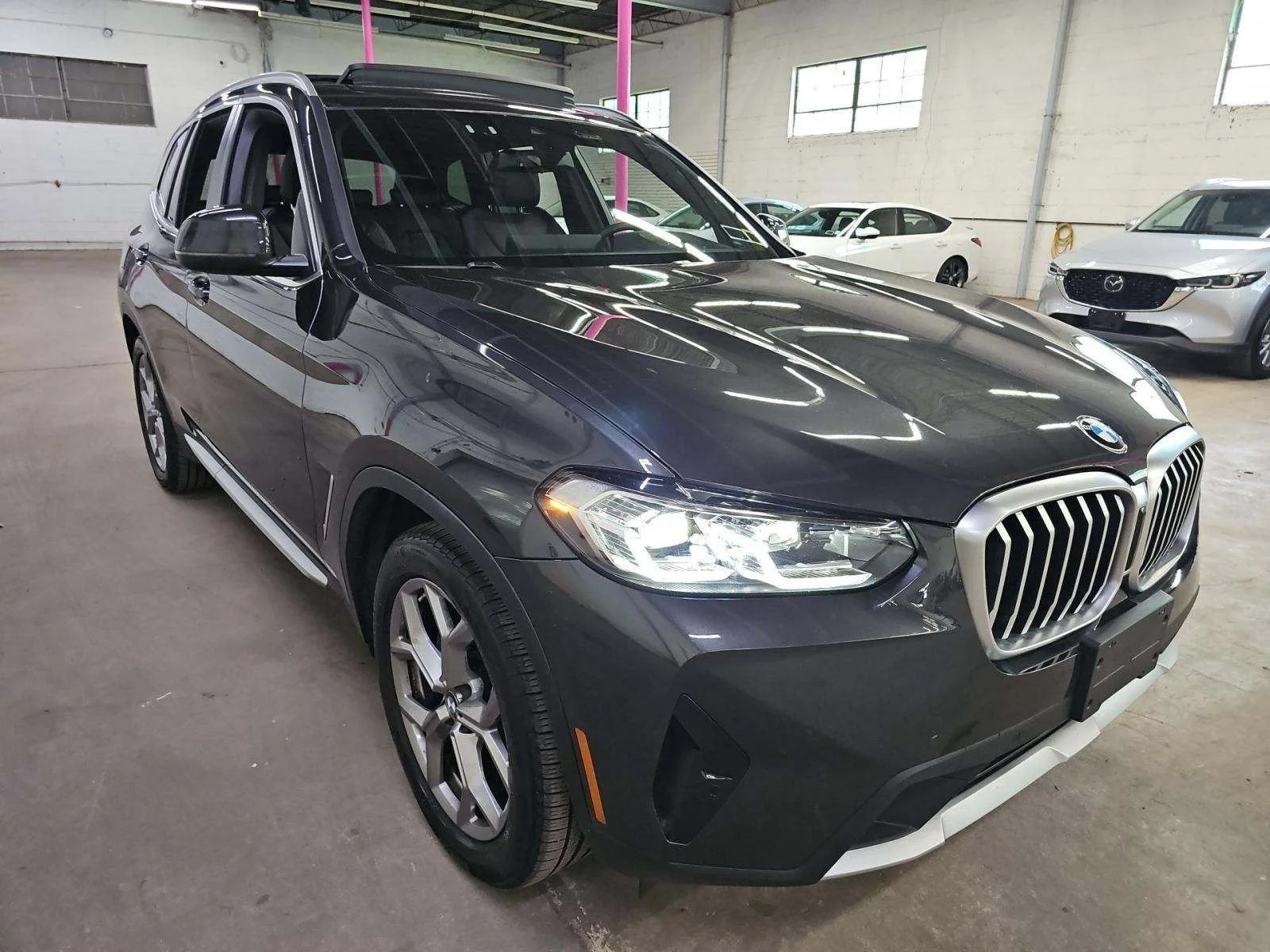 Used 2023 Dark Graphite Metallic BMW xDrive30i image 4