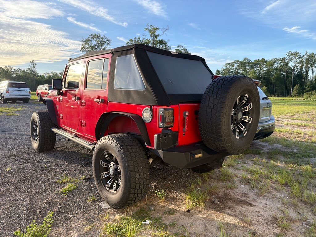 Used 2015 Red Jeep Unlimited Sport image 7