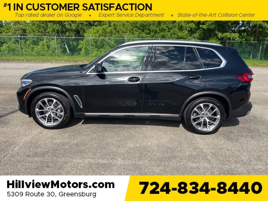 Certified Used 2022 Black Sapphire Metallic BMW xDrive40i image 2