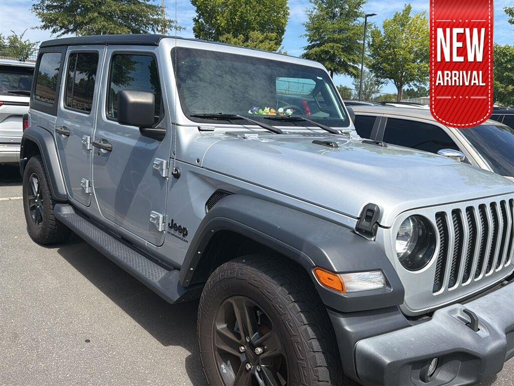 Used 2023 Silver Zynith Clearcoat Jeep Sport Altitude image 1